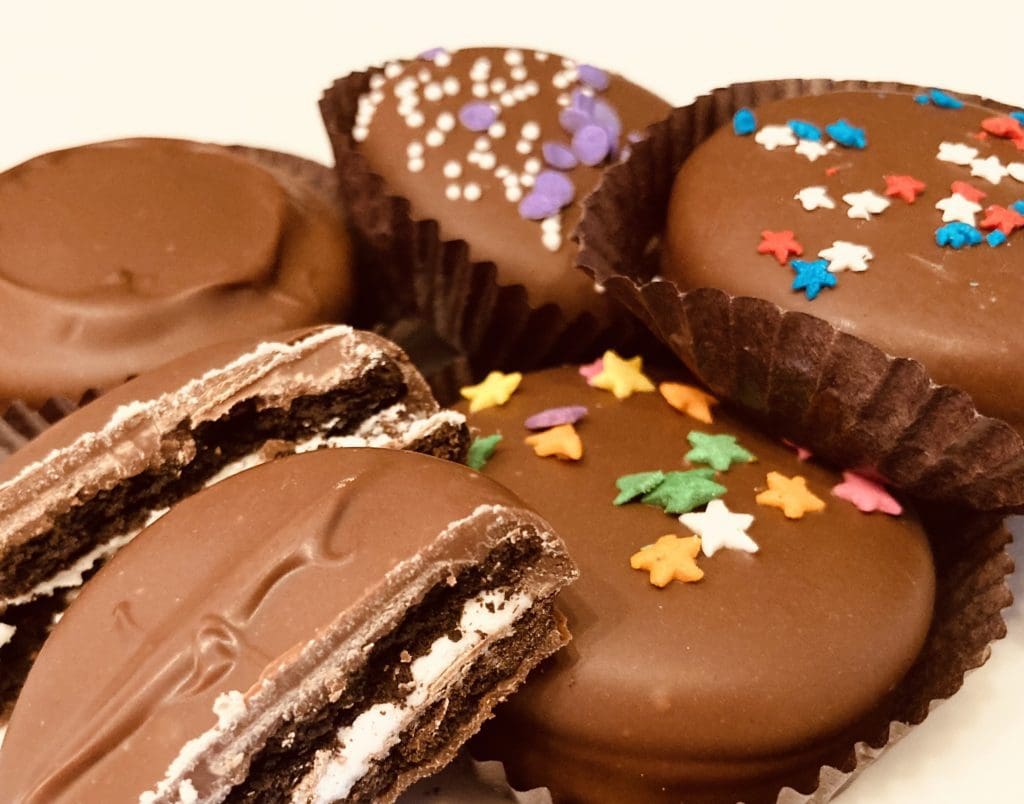 Chocolate Covered Oreos with star sprinkles